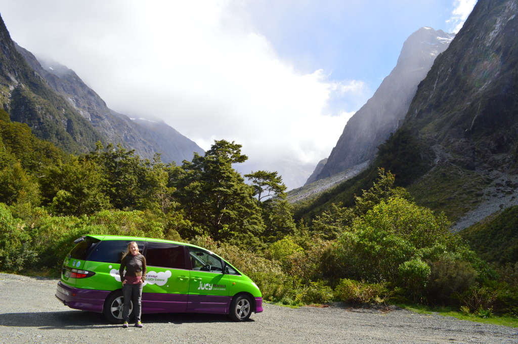 Shannon and the Jucy Campa Van in New Zealand near Milford Sound