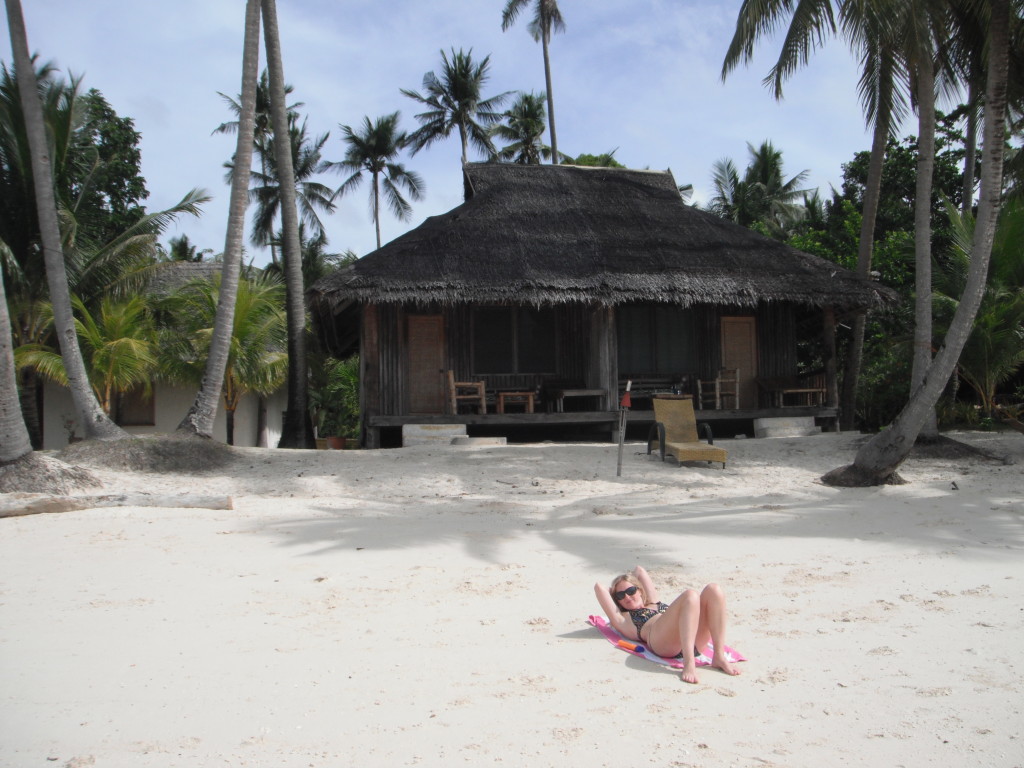 Shannon in front of our Coral Cay Bungalow in Siquijor, Philippines